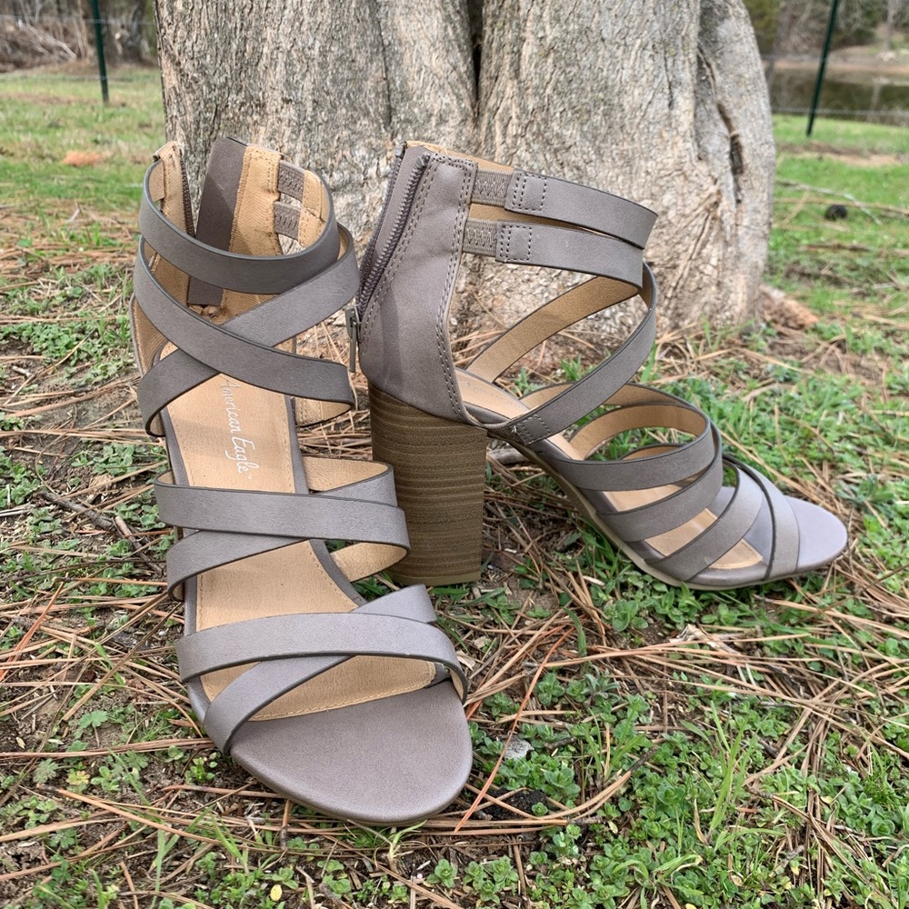 Size 7.5 Grey/ Taupe colored  American Eagle brand. 3.5” heels. Zip up back.